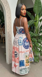 Florida Postcard Maxi Dress by My Store, featuring a flowy fabric and vibrant tropical print, perfect for summer or beachwear.