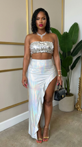 Metallic sequin crop top and skirt set by Deme & Anor, featuring shiny fabric and fitted silhouette for a stylish look.