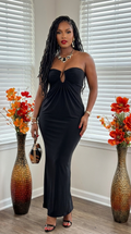 Elegant Glamour With Modern Construction maxi dress in soft fabric, featuring a stylish neckline and flowing silhouette.